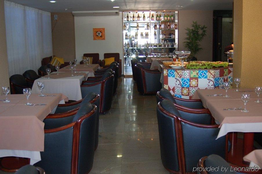 Like Ue Hotel جويانيا المطعم الصورة