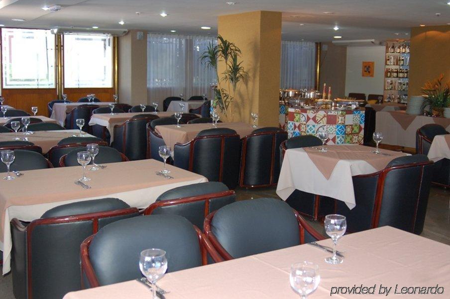 Like Ue Hotel جويانيا المطعم الصورة